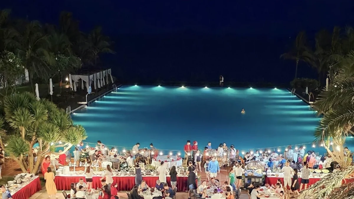 Poolside resort event dinner setup in Vietnam
